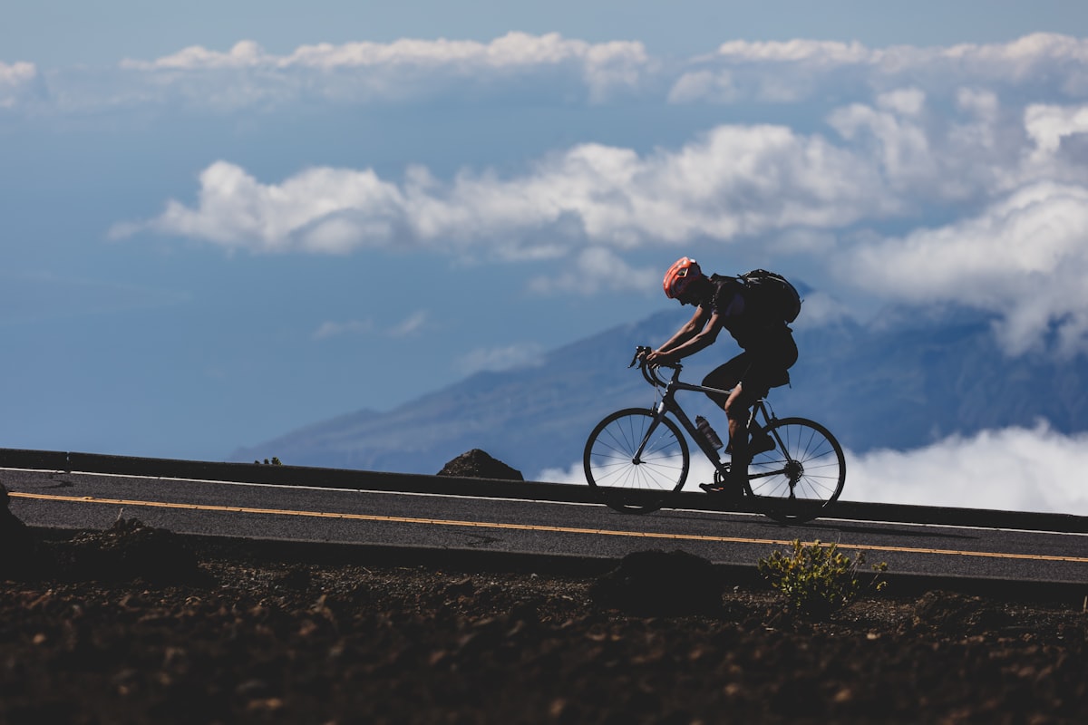 Cyclist smiling on a country road