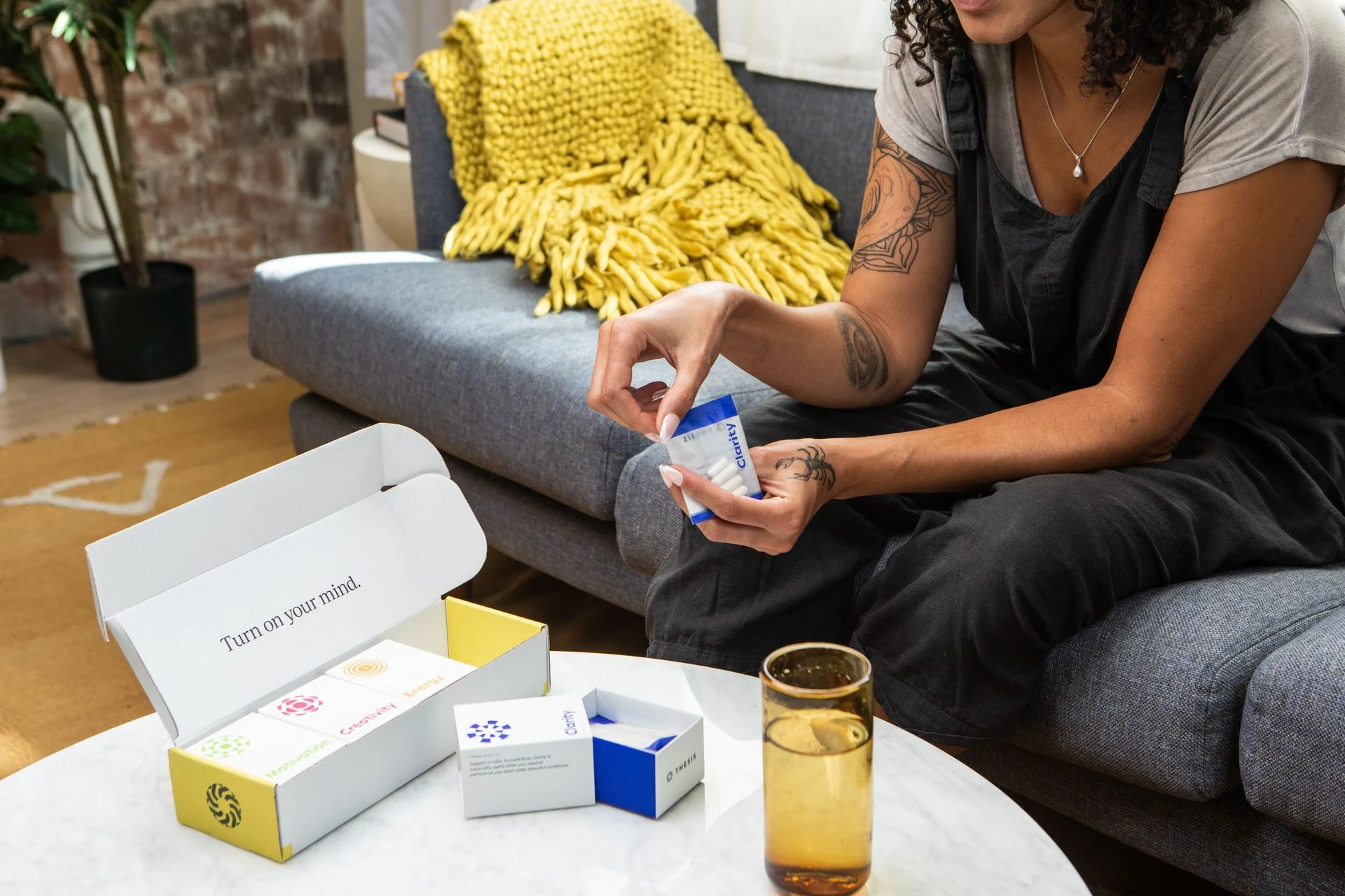 Woman preparing her supplements at home