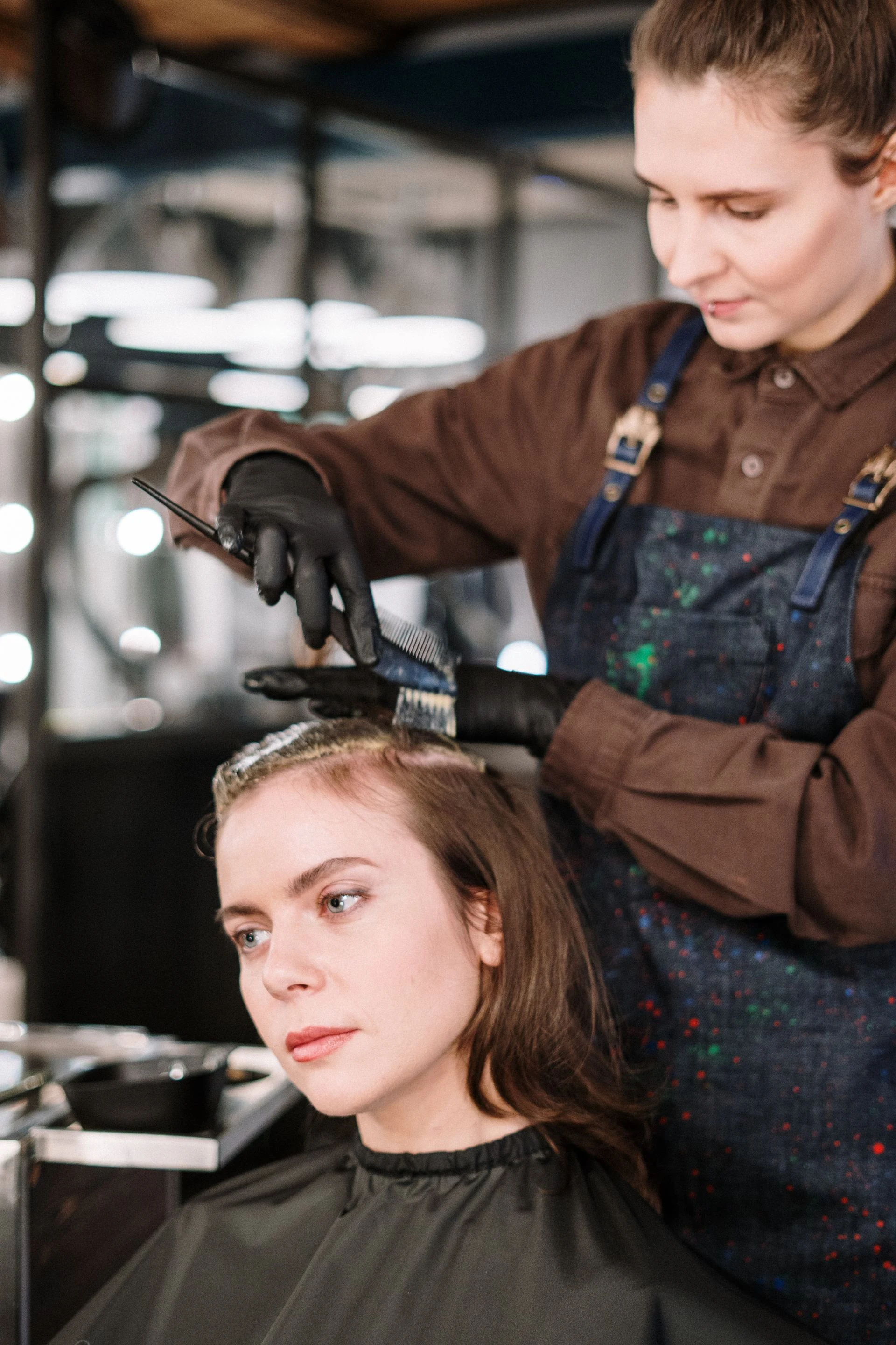Salon professional styling a client’s hair